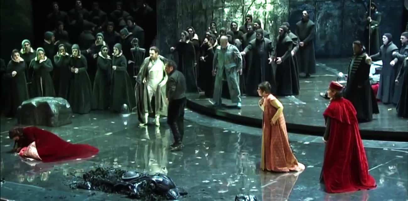 Otello throws Desdemona to the floor